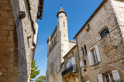 Monflanquin, france - october 17, 2021 architectural detail of typical houses in the city center