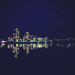 Bridge over river at night