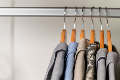 Close-up of clothes hanging on rack