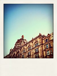 Low angle view of building against clear sky