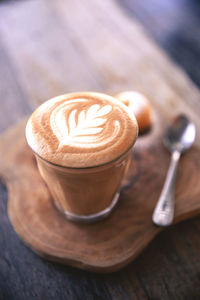 Close-up of cappuccino on table