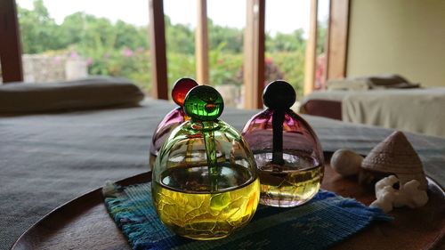 Close-up of drinks on table at home