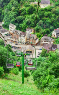 High angle view of train amidst buildings in city