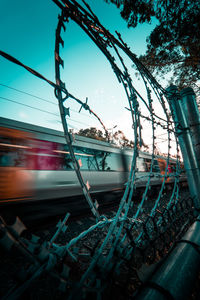 Train on railroad track against sky