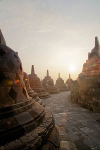 Borobudur temple against sky during sunrise