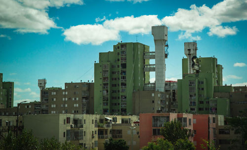 Modern buildings against blue sky