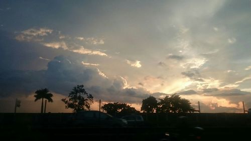 Scenic view of cloudy sky at sunset