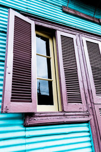 Low angle view of window of old building