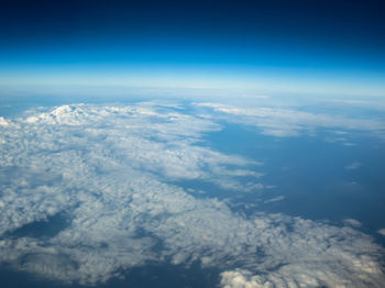 Aerial view of cloudscape against blue sky