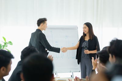 Business colleagues working at office