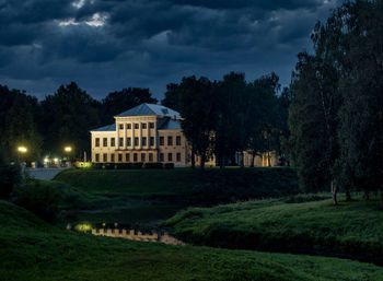 View of lawn with buildings in background