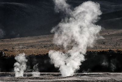 Smoke emitting from geyser