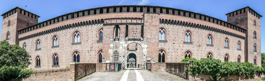 Exterior of historic building against clear sky