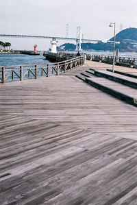 Pier over sea against sky