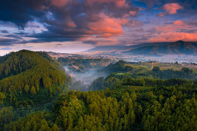 Scenic view of landscape against sky during sunset