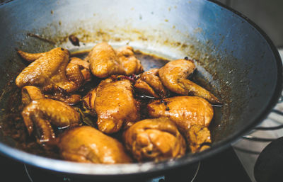 High angle view of meat in cooking pan