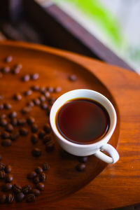 High angle view of coffee cup on table