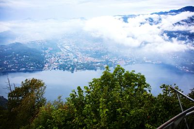 Scenic view of mountains against cloudy sky