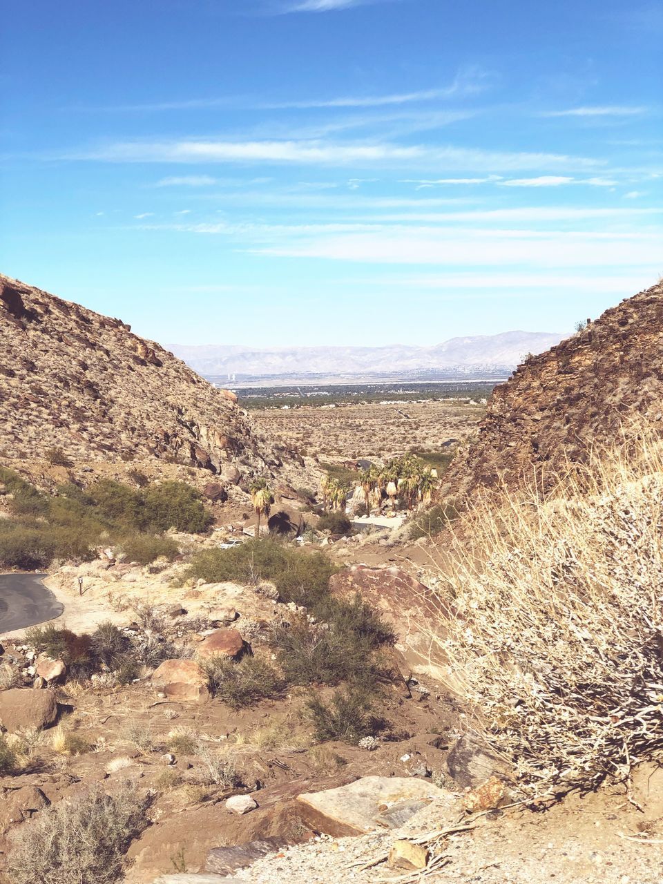 SCENIC VIEW OF DESERT LANDSCAPE AGAINST SKY