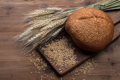 High angle view of wheat on table