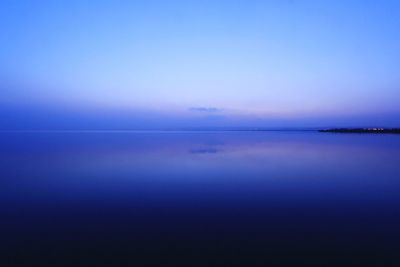 Scenic view of calm sea against clear sky