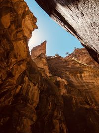 Vibrant photo looking up at sky from canyon