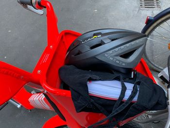 High angle view of red bicycle in city