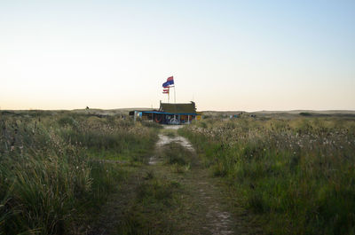 Scenic view of land against clear sky