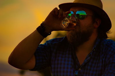 Close-up of young man wearing sunglasses