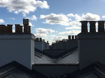 Chimneys on roof against sky