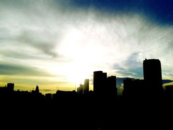 Silhouette of buildings at sunset