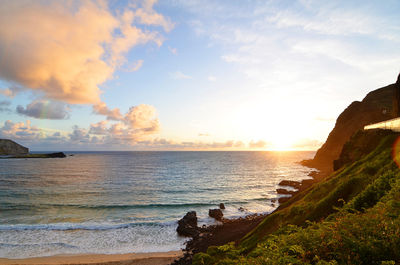 Scenic view of sea against sky during sunset