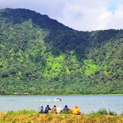 People relaxing in lake