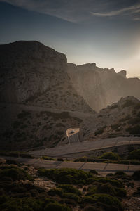 Scenic view of mountains against sky at formentor lighthouse, mallorca, spain.