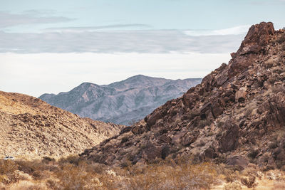 Scenic view of rocky mountains against sky