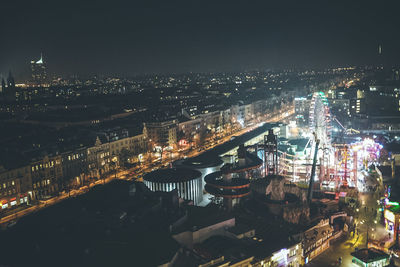 Illuminated cityscape at night