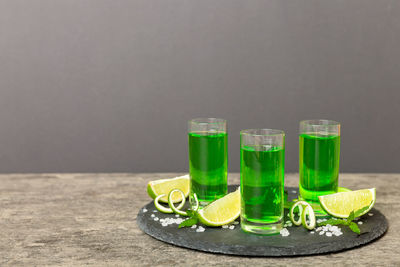 Close-up of glass bottles on table