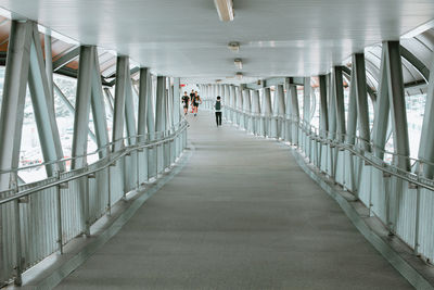 People walking on bridge