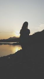 Scenic view of sea at sunset