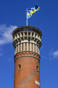 Low angle view of building against blue sky