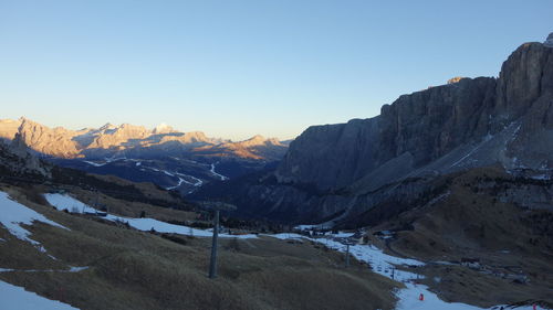 Scenic view of mountains against sky during winter