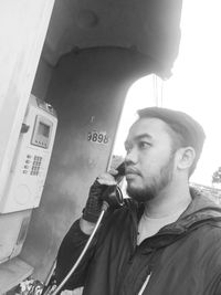 Portrait of young man looking away