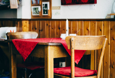 Empty table and chairs at caf