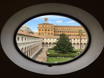 Buildings seen through window