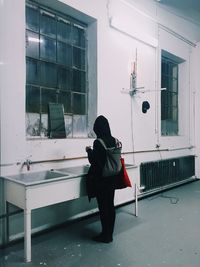 Woman walking in building