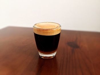 Close-up of beer in glass on table