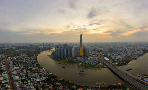 High angle view of city against sky during sunset