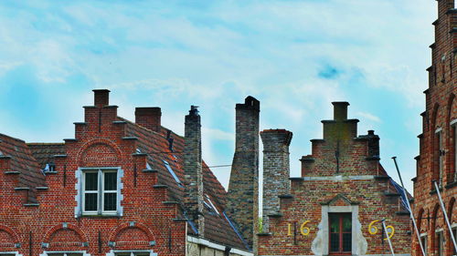 Low angle view of buildings against sky