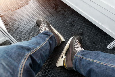 Low section of man standing on floor