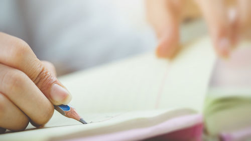 Close-up of man holding hands